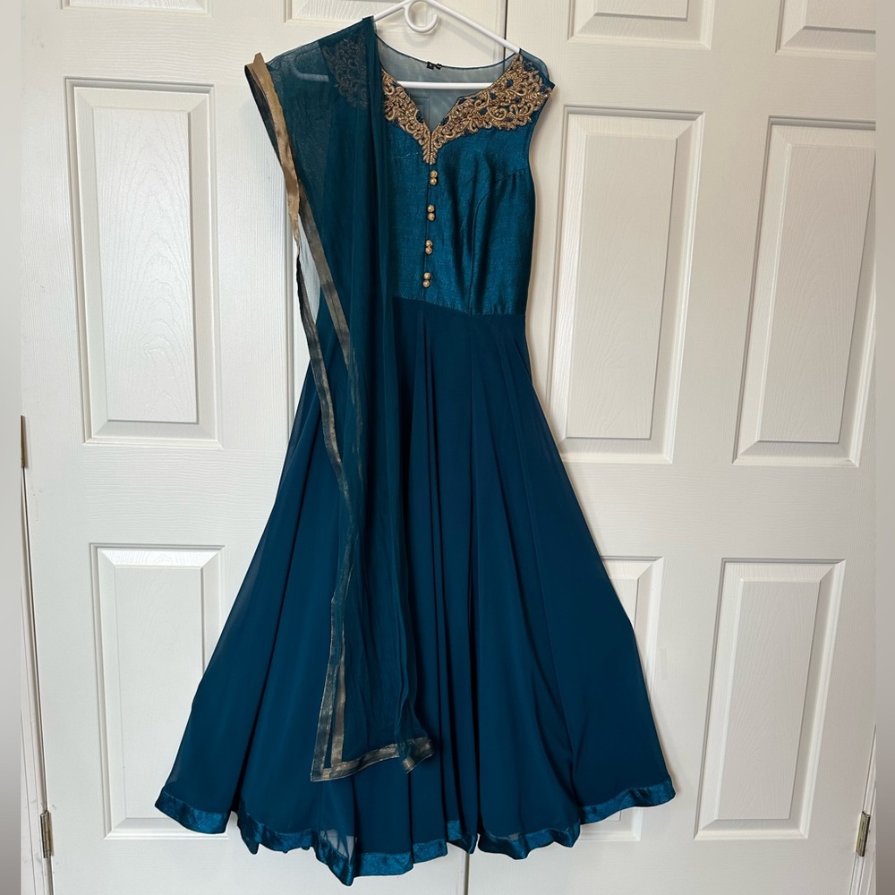 Blue Gown with Mesh and Gold Detailing